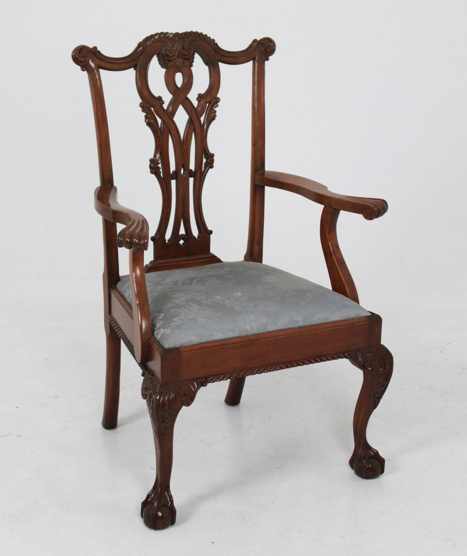 NEW ENGLAND CHIPPENDALE STYLE MAH. ARM CHAIR: NEW ENGLAND CHIPPENDALE STYLE MAHOGANY ARM CHAIR HAVING SERPENTINE CARVED SCROLL BACK WITH OPEN WORK VASE SPLAT, THEN FAN CARVED ARMS RESTING ON GADROON TREATED SEAT RAIL, FINALLY SUPPORTED BY ANCANTH