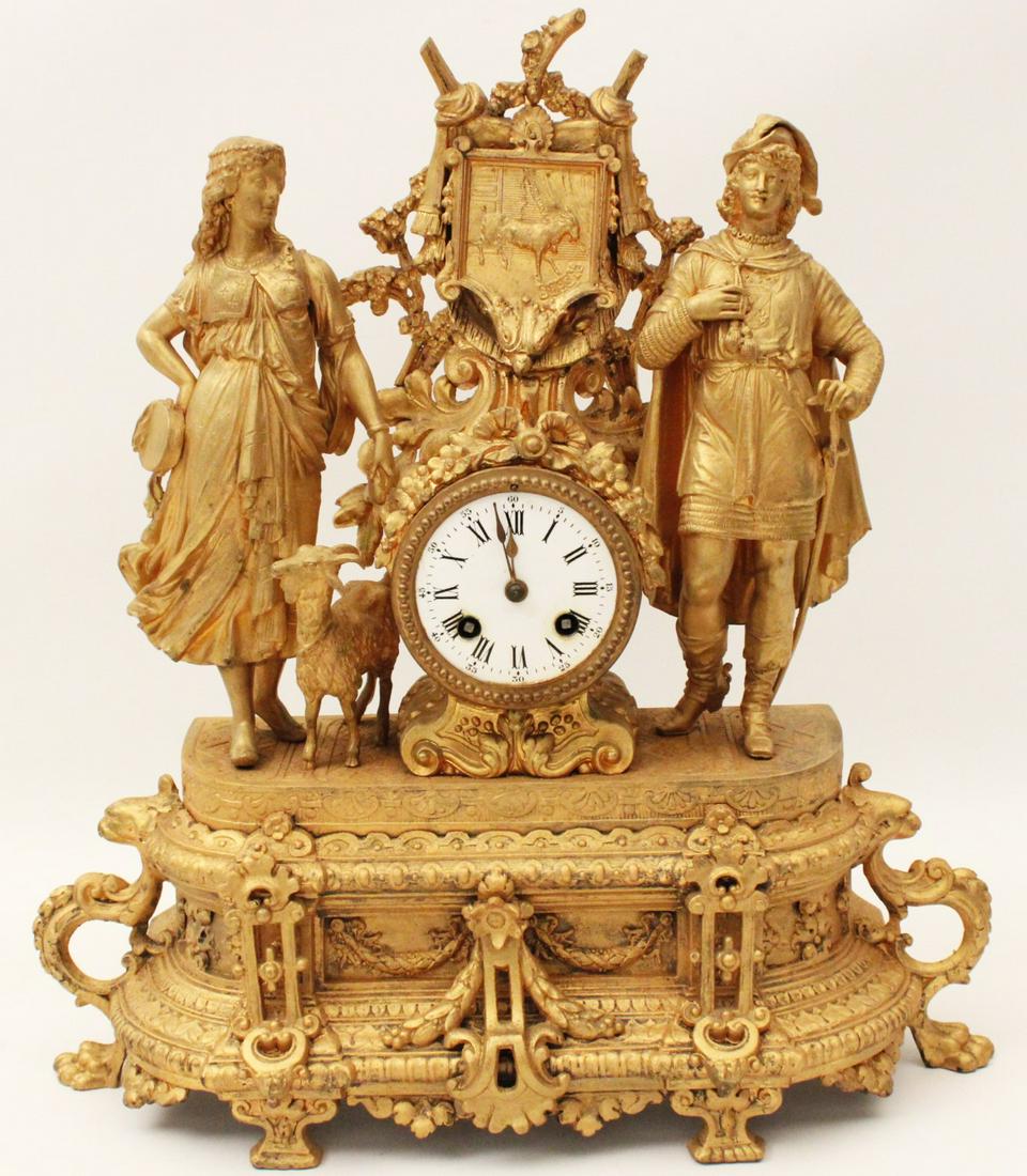 PATINATED GILT METAL FRENCH FIGURAL CLOCK: PATINATED GILT METAL FRENCH FIGURAL CLOCK; 17.5"H X 15.5"W
