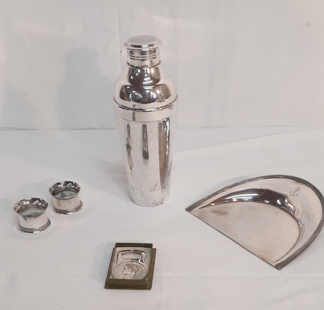 5 PC. LOT OF FRENCH CHRISTOFLE SILVER TABLE: MISCELLANEOUS 3 PIECE LOT OF FRENCH CHRISTOFLE SILVER TABLE ARTICLES INCLUDING CRUMMER, COCKTAIL SHAKER, PAIR OF NAPKIN RINGS, AND NAPOLEON BOTTLE OPENER