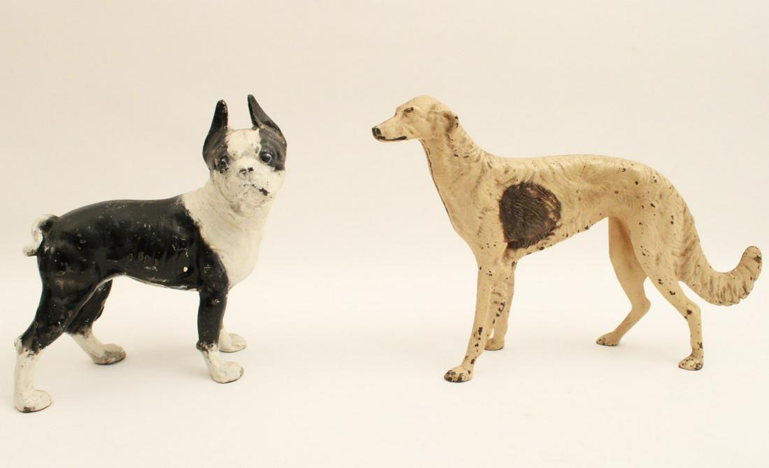 MISC. LOT OF TWO CAST IRON DOOR STOPS (1 of 3)