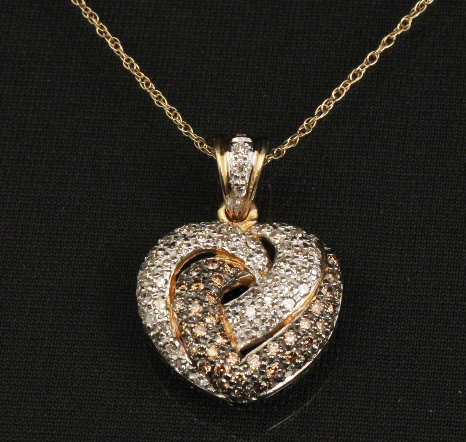 14K CHAMPAGNE & WHITE DIAMOND NECKLACE: 14K YELLOW GOLD CHAMPAGNE AND WHITE DIAMOND HEART DESIGN NECKLACE ON 18" CHAIN; 0.86 CTW DIAMONDS; **ALL JEWELRY OR COINS MUST BE PAID WITH WIRE TRANSFER, CASHIERS CHECK OR MONEY ORDER