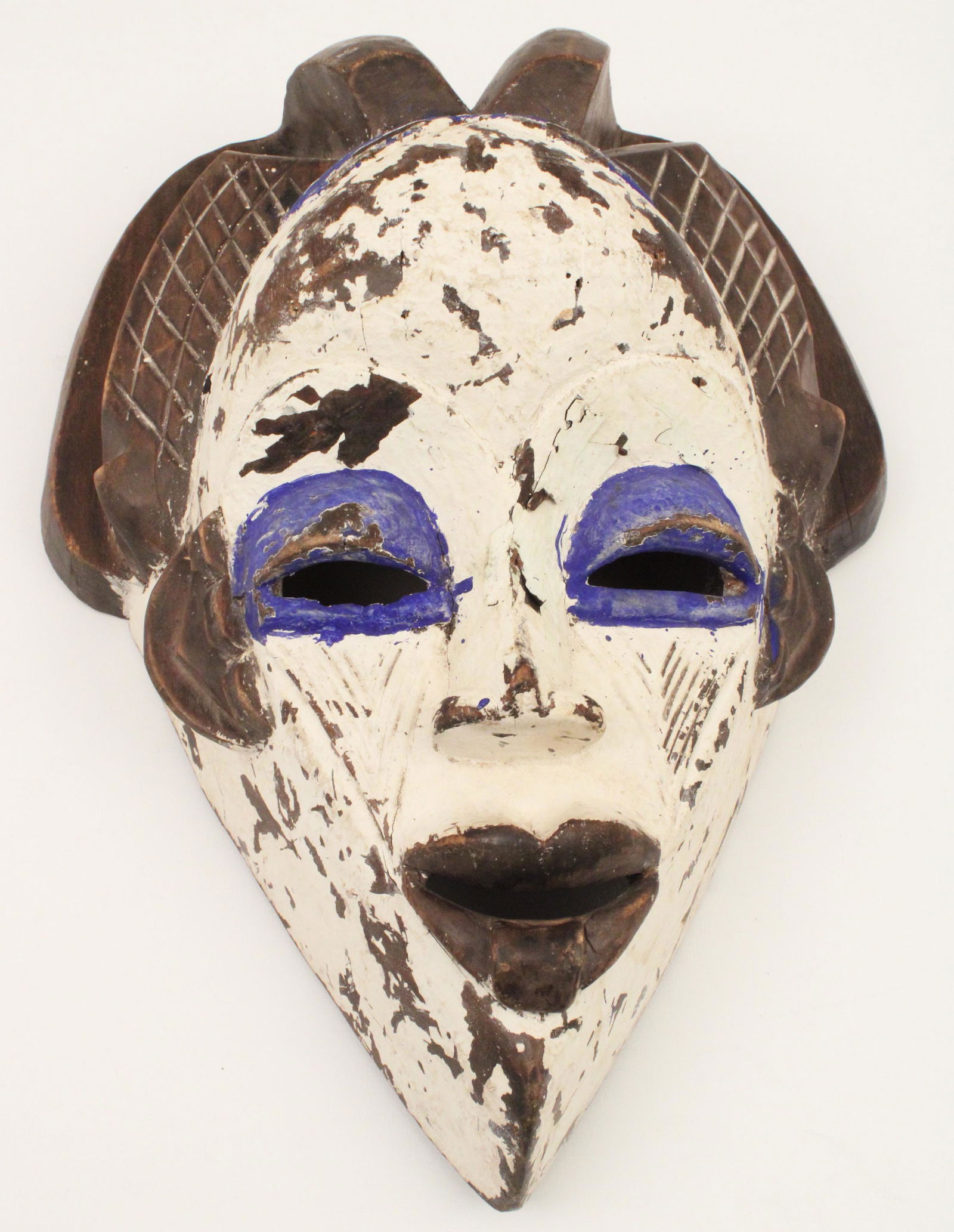 Polychrome carved wood ceremonial mask (1 of 3)