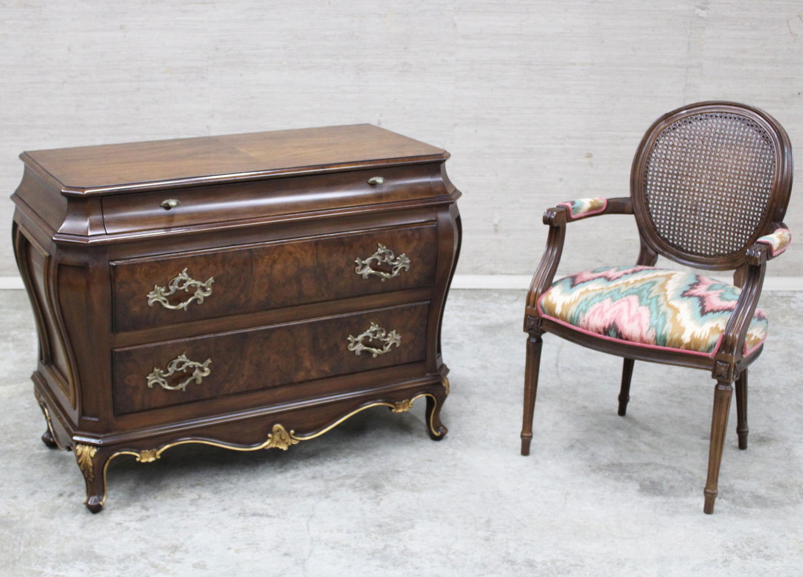 2 pc. lot of French style furniture: 2 piece lot including Louis XV style commode and Louis XVI style armchair; commode 32"H 42.5"W 20"D chair 36"H 22"W 24"D
