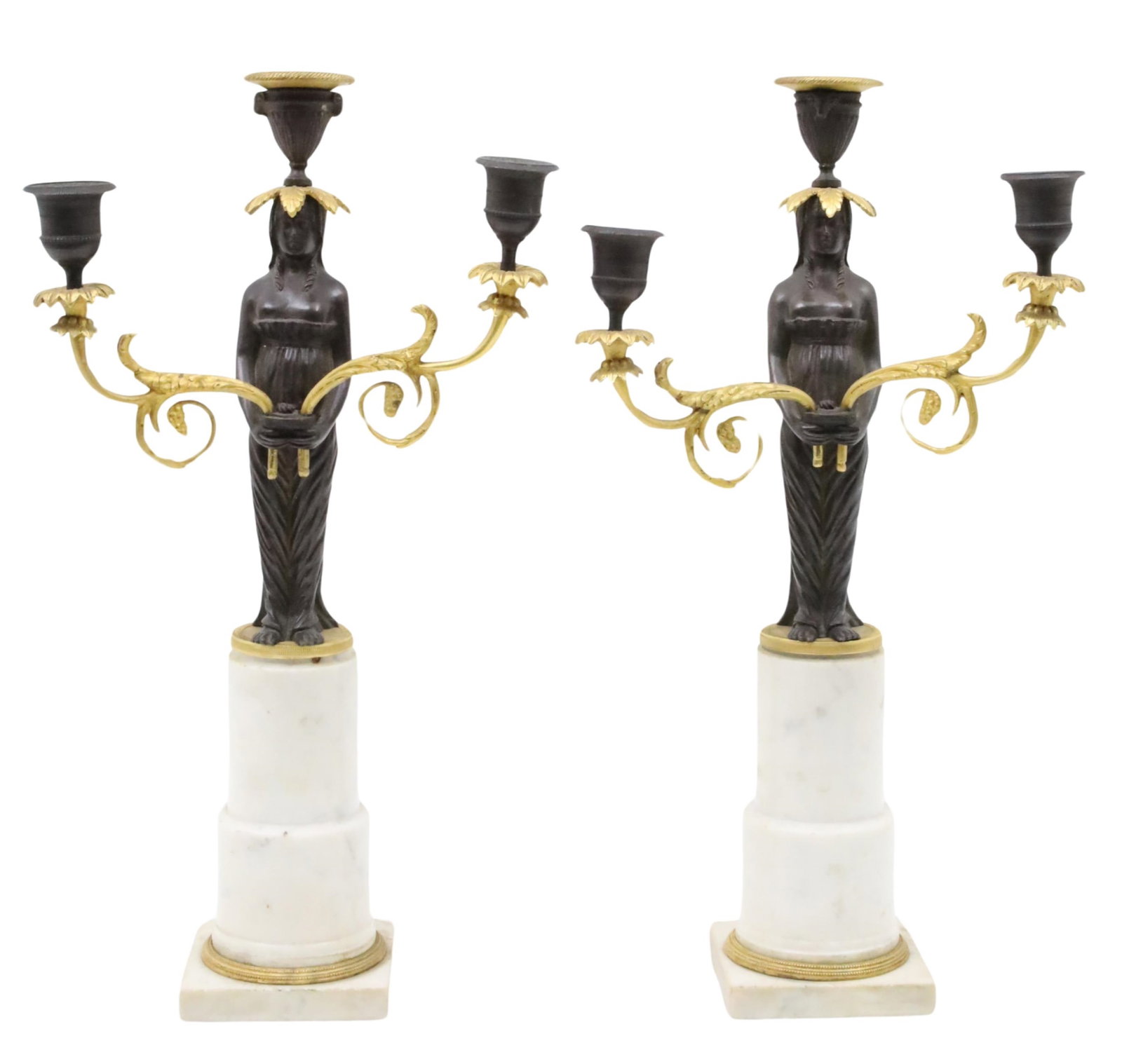 PR FRENCH EMPIRE CANDELABRA: Pair of early French Empire dore bronze accented three light candelabra having partially nude female supports on a conforming white marble plinth, early 19th century; 15"H