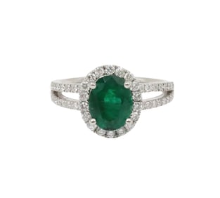 PLATINUM EMERALD AND DIAMOND RING