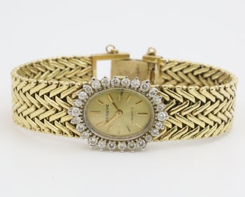GENEVE 14K YG AND DIAMOND LADIES WATCH
