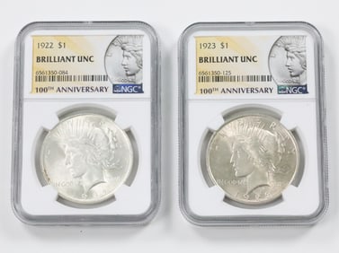 TWO NGC GRADED AMERICAN SILVER PEACE DOLLARS