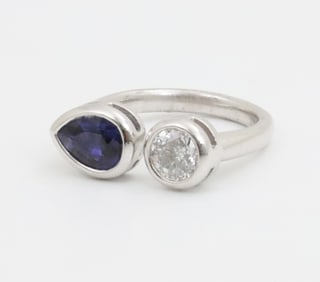 DIAMOND SAPPHIRE AND PLATINUM RING