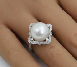 SS PEARL DIAMOND AND PLAT. RING, GIA