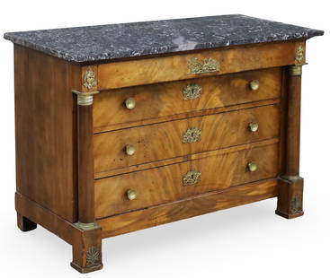 FRENCH EMPIRE MARBLE TOP COMMODE: French Empire mahogany commode, having variegated marble top above blind freize drawer and three lower drawers, bronze mounted column supports, 19th century; 36"H 52"W 25"D