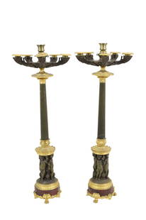PR FRENCH EMPIRE BRONZE CANDELABRA, 19TH C.: Pair of French Empire 6 light bronze candelabra, having fluted column above putti supported rouge marble plinth, 19th century; 26"H 9"Diameter