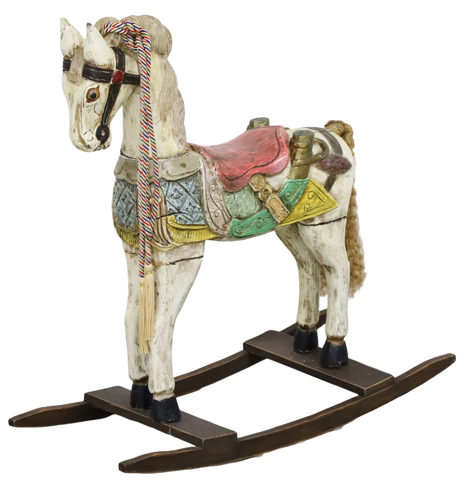 POLYCHROME CARVED WOOD ROCKING HORSE: Polychrome and carved wood rocking horse with straw rope tail, early 20th century, mounted to later rocking stand; 32.5"H 34"W 15"D