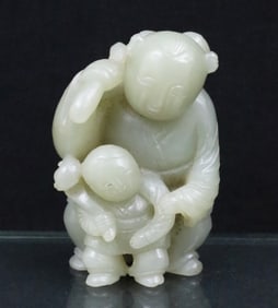 CHINESE CARVED JADE FIGURE OF MAN AND BOY, QING