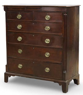 ENGLISH MAHOGANY INLAID HIGH CHEST, 19TH C.: English mahogany high chest, in the Sheraton taste, satinwood inlaid frieze with center blind drawer, with column supports flanking double drawer above four additional drawers, 19th century; 54.5"H 48