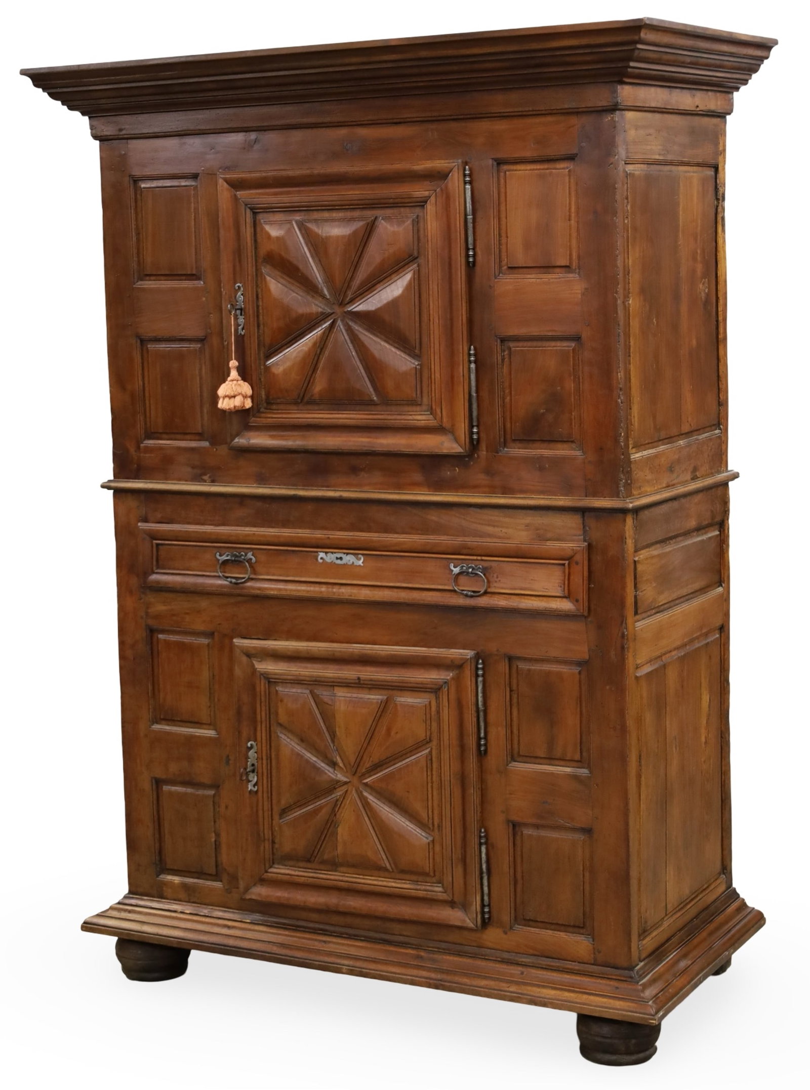 LOUIS XIII WALNUT HOMME DEBOUT CABINET, 18TH C.: Louis XIII style walnut Homme Debout or "standing man" cabinet having raised star panel doors and center drawer, resting on bun feet, 18th century; 84"H 53"W 27"D