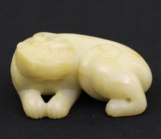 CHINESE CARVED JADE BEAST, 19TH C.