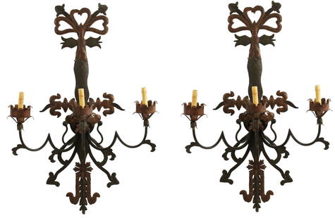 PR 40" EUROPEAN STYLE METAL SCONCES: Pair of European style metal sconces with open bowtie top over three arms with turret crown ornaments, 20th century; 40"H 27"W
