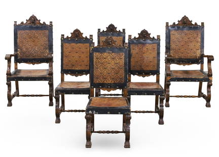 6 SPANISH RENAISSANCE REVIVAL DINING CHAIRS: Set of six Spanish Renaissance Revival dining chairs, including four side chairs and pair of armchairs, having carved crest rails with conquistador bust reliefs, covered with heraldic embossed leather