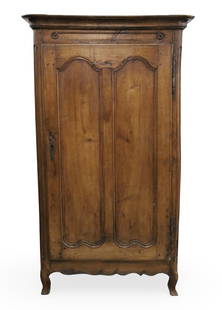 FRENCH PROVENCAL WALNUT BONNETIERE, 19TH C.: French Provencal Louis XV style walnut bonnetiere cabinet, having double shaped panel door and scalloped apron, 19th century; 81"H 42"W 24"D