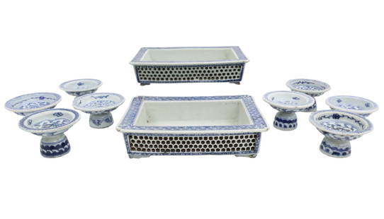 10PC CHINESE BLUE AND WHITE PORCELAIN: Ten piece lot of Chinese blue and white porcelain, including two reticulated jardinieres and eight high footed bowls, late 19th/early 20th century; jardinieres 7"W 9"D footed bowls 2.25"H 3.25"Diamete