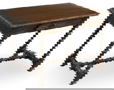 FRENCH OAK WRITING TABLE, 19TH C.: French oak writing table, having egg and dart molded edge top and single carved drawer, raised on turned legs and stretcher, 19th century; 37.5"H 39"W 30"D