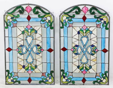 PR TIFFANY STYLE STAINED GLASS WINDOWS: Pair of Tiffany style stained glass windows, 20th century; 35.5"H 22"W
