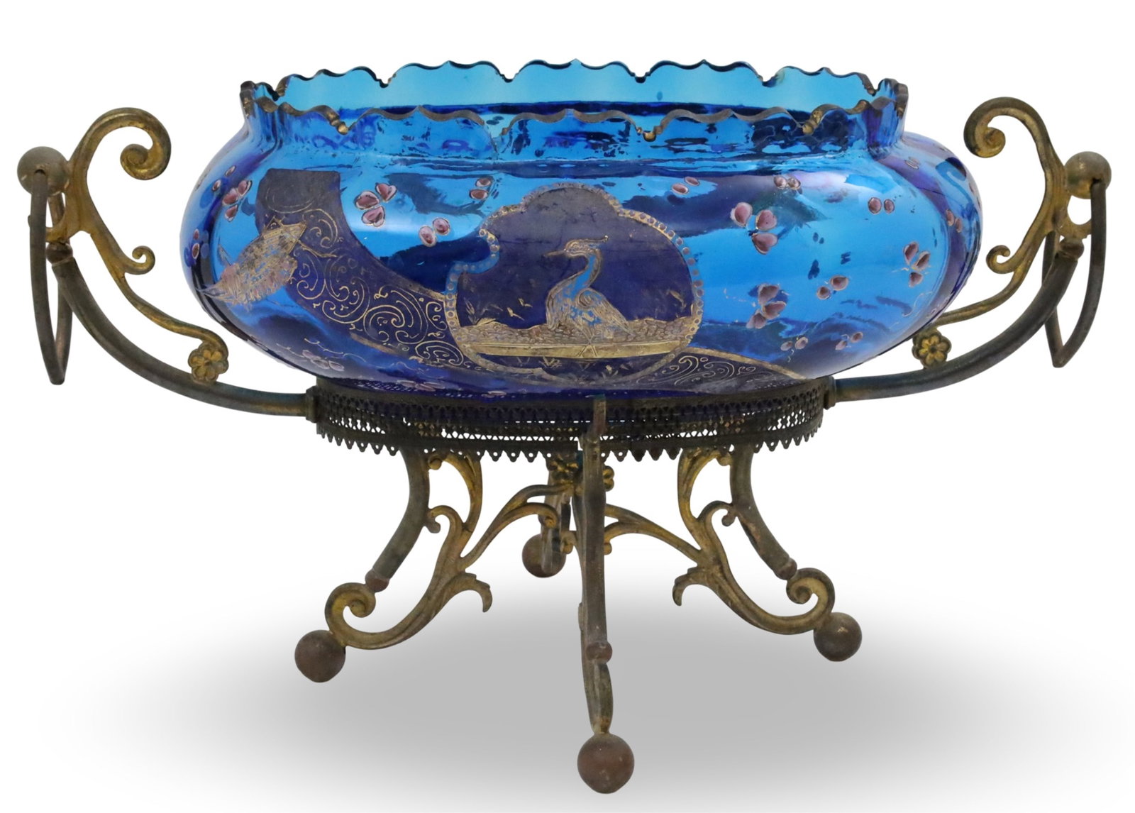 MOSER COBALT BLUE ART GLASS CENTERPIECE: Moser cobalt blue art glass centerpiece, scalloped edge rim and the body with delicate gilt and enamel floral overlay and center reserve of a crane, resting on double handled gilt metal stand, 19th ce