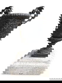 LARGE FRENCH CAST IRON GARDEN URN: French cast iron garden urn, 19th century, of classical campana form with scrolled handles and acanthus decoration. 29"H (top of handle).The body is adorned with neoclassical relief motifs and rests o