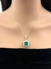14K EMERALD AND DIAMOND PENDANT