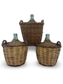 THREE FRENCH WICKER-COVERED GLASS DEMIJOHNS