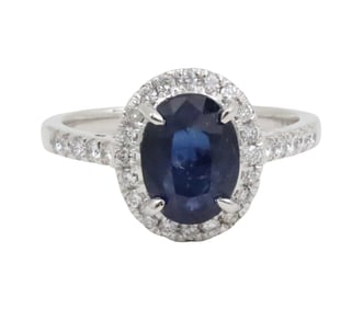 PLATINUM SAPPHIRE AND DIAMOND RING