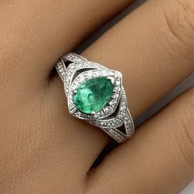 PLATINUM GIA EMERALD AND DIAMOND RING