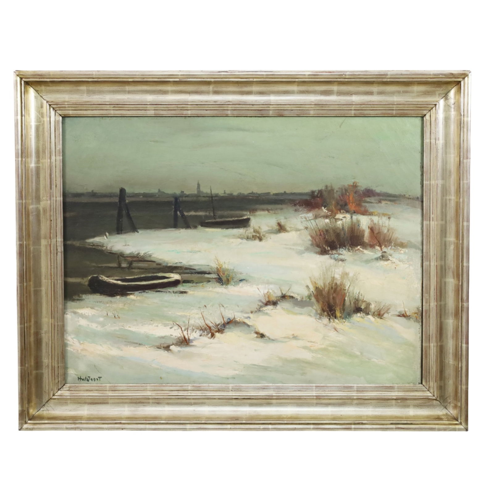 GERMAN OIL ON CANVAS COASTAL SCENE PAINTING: German oil on canvas winter coastal scene painting depicting a river estuary with boats moored at the shoreline, signed Halsteert? lower left, early 20th century, mounted in silver gilt frame; overall