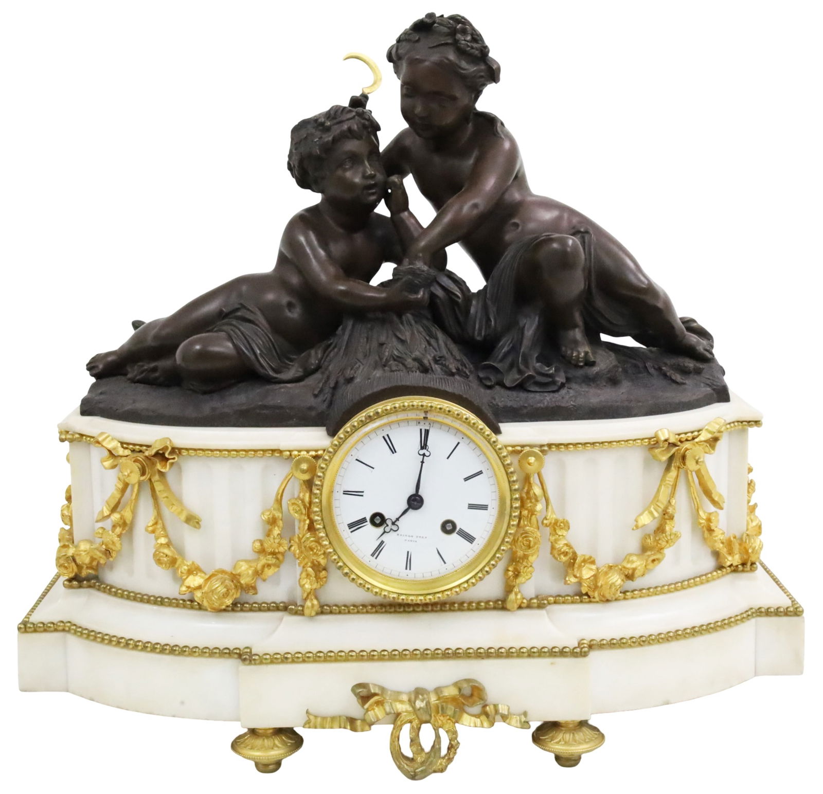 NAPOLEAN III MANTLE CLOCK, RAINGO FRERES, PARIS: Napolean III mantle clock, white marble plinth adorned with gilt bronze festooning, mounted with bronze sculpture of putti, white enamel dial marked Raingo Freres, Paris, 19th century; 18"H 19.5"W 8"D