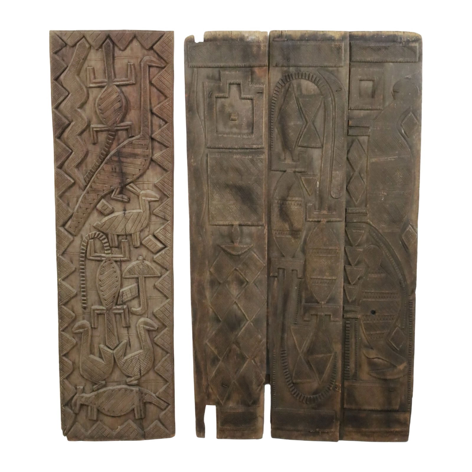 AFRICAN NUPE CARVED WOOD PANELS: Two piece lot of large African carved wood panels, Nupe people, Nigeria, consisting of a single panel with geometric birds and animals in relief, along with a three part door or partition, early to mi