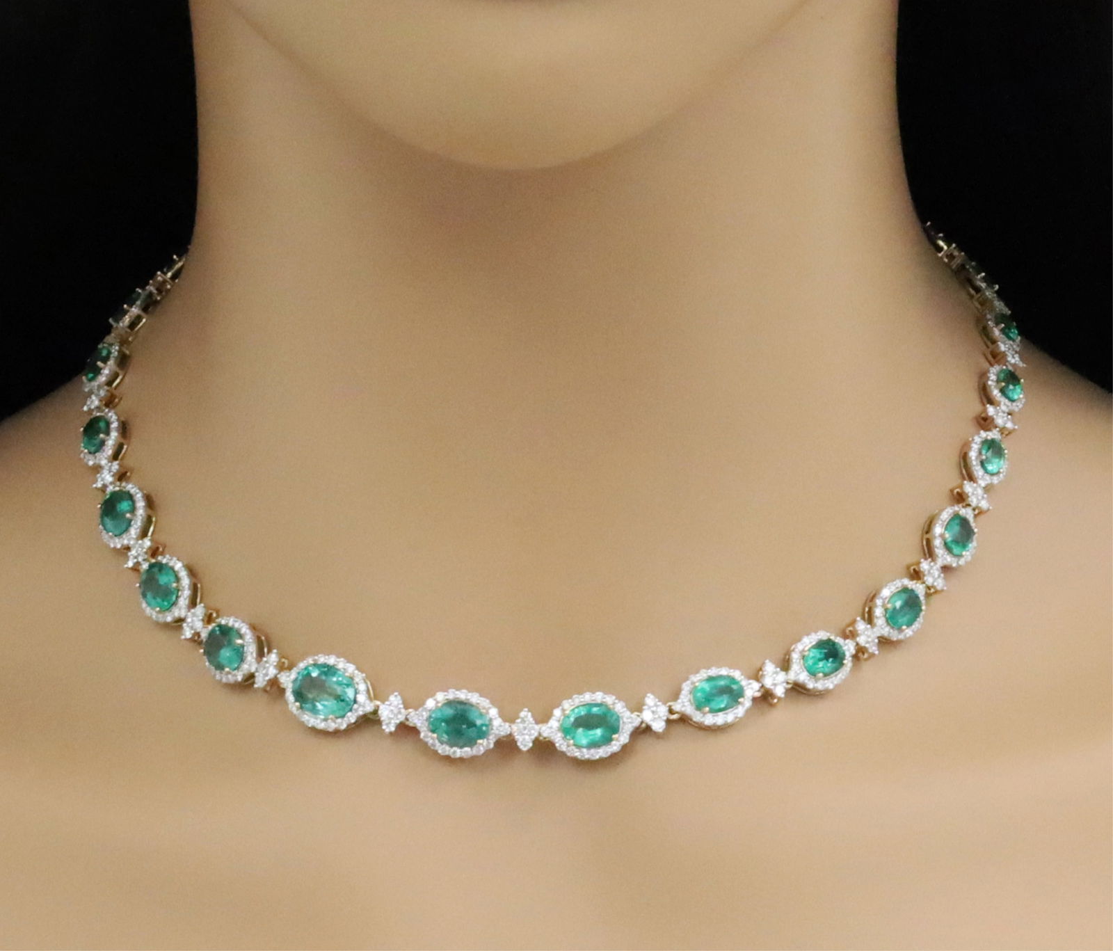 14K EMERALD AND DIAMOND NECKLACE: 14k yellow gold emerald and diamond necklace having 18.25cts of emeralds and 7.9cts of diamonds. gross weight is 32.9grams. Please see all photos and appraisal for $65270 Note: this lot must be paid