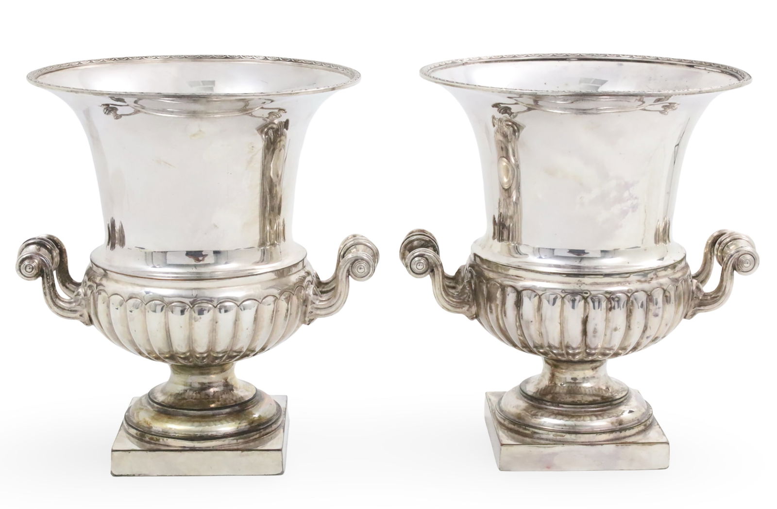 PR SILVERPLATE CHAMPAGNE/WINE COOLERS: Pair of American silverplate champagne or wine coolers, stamped with marks of Crown Silver Company, Massachusetts, on reverse; each 10"H 9"W 4.25" base