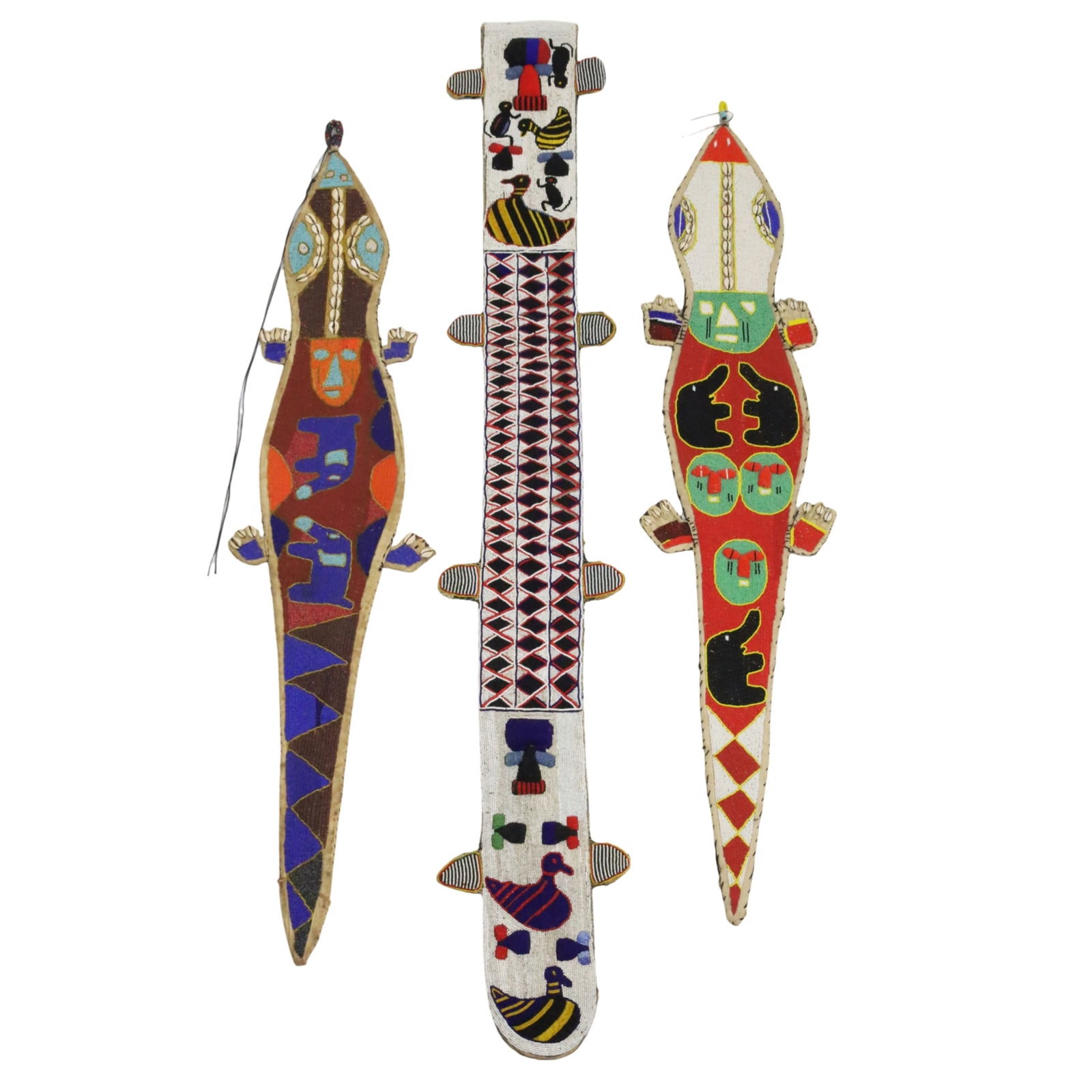 3 YORUBA BEADED CEREMONIAL SASHES: Group of three Yoruba bead and cowrie shell cermonial items sashes, including two lizard form diviner sashes, early 20th century; 52"L; Provenance: Estate of Clara Juanita "Vicki" Jones of Cosby, Tenn
