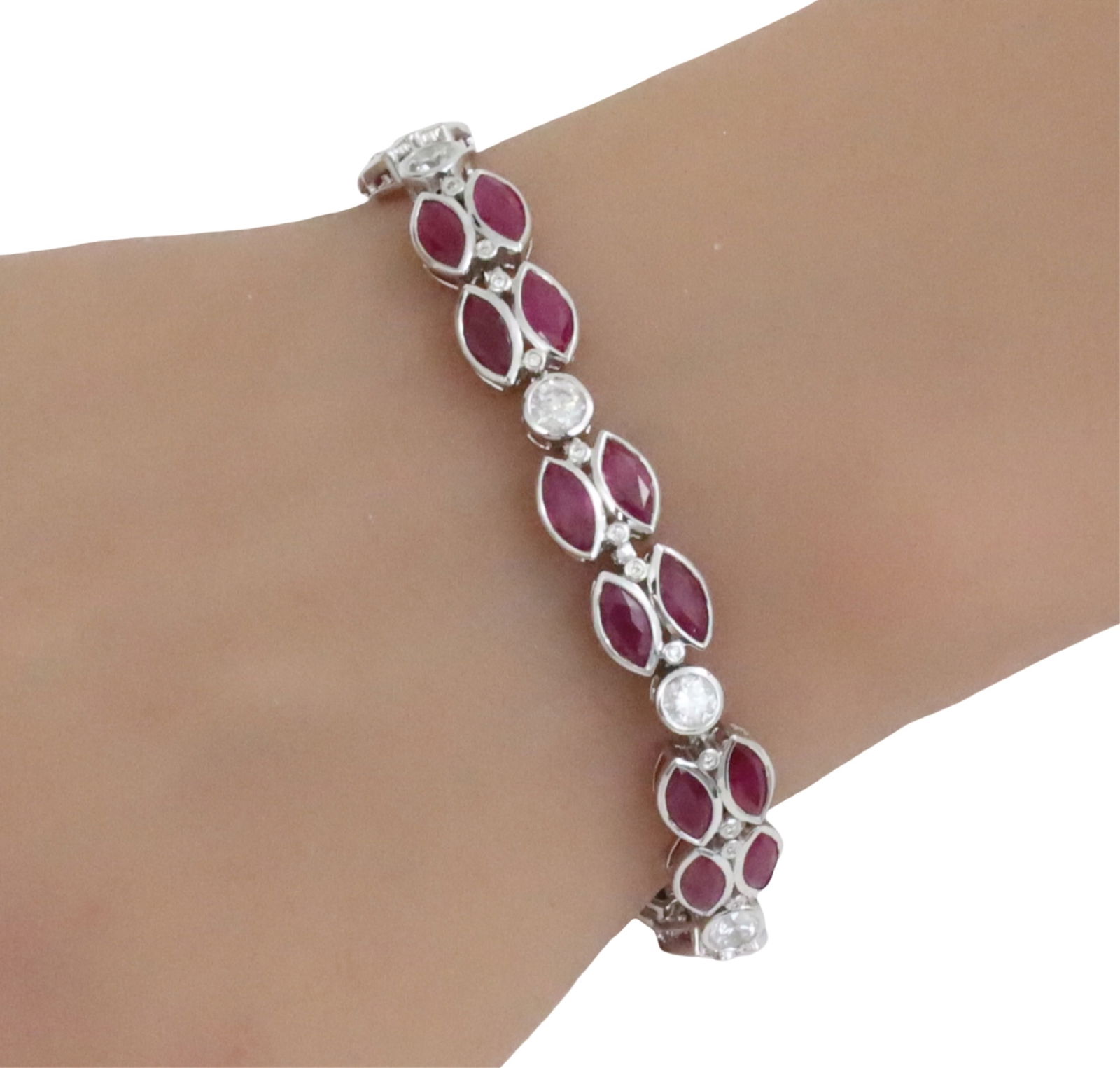 PLATINUM BURMESE RUBY AND DIAMOND BRACELET, GIA: Platinum bracelet mounted with 32 genuine Burmese rubies weighing approx. 12.27carats and 40 round diamonds weighing 2.18 carats. length is 7inches. total weight is 26.3grams. Please see all photos, a