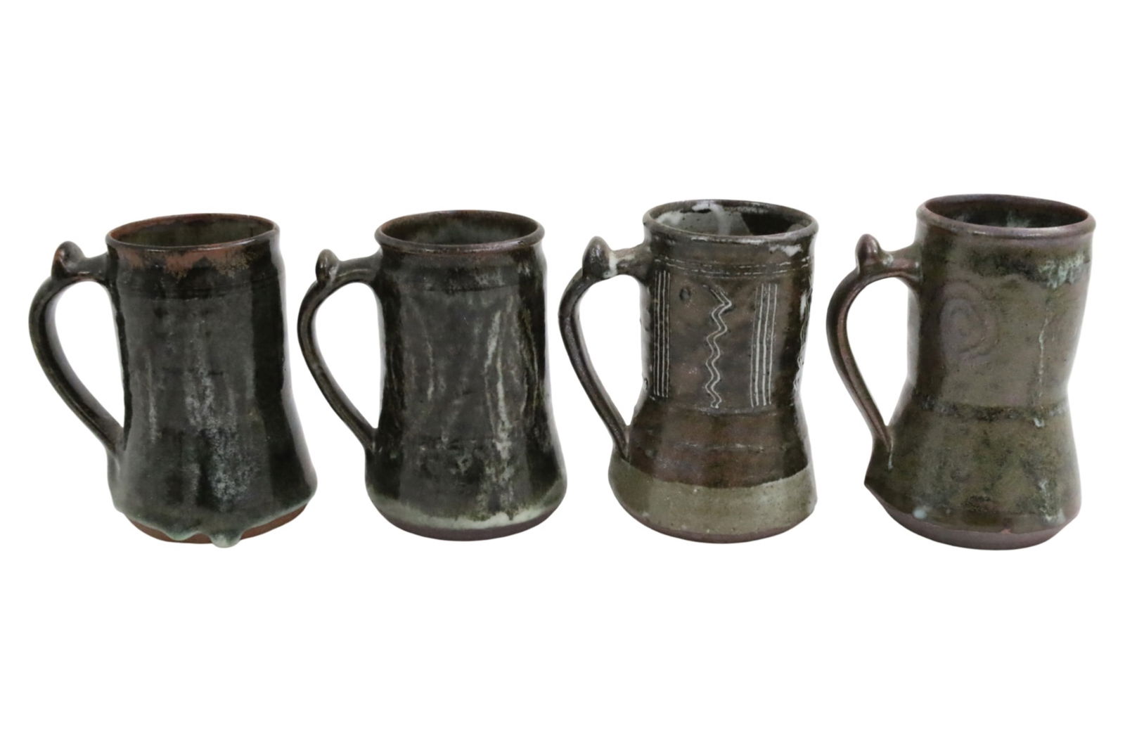 LADI KWALI (NIGERIAN, c.1925-1984): Collection of four African drip glaze earthenware pottery tankards by Ladi Kwali of Abuja Pottery Training Centre, Nigeria, circa 1960, each stamped by artist with Arabic seal; each approximately