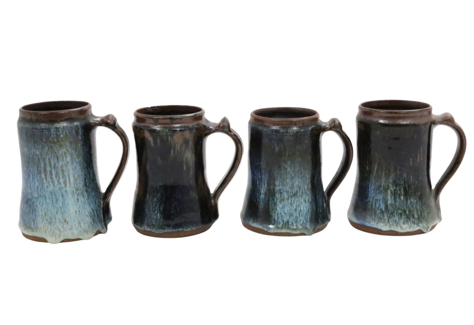 FOUR SIGNED ABUJA POTTERY TANKARDS: Group of four African drip glaze earthenware pottery tankards, Abuja school, Nigeria, having rich variegated glaze, each stamped by artist, mid to late 20th century; each approximately 5"H; Provenance