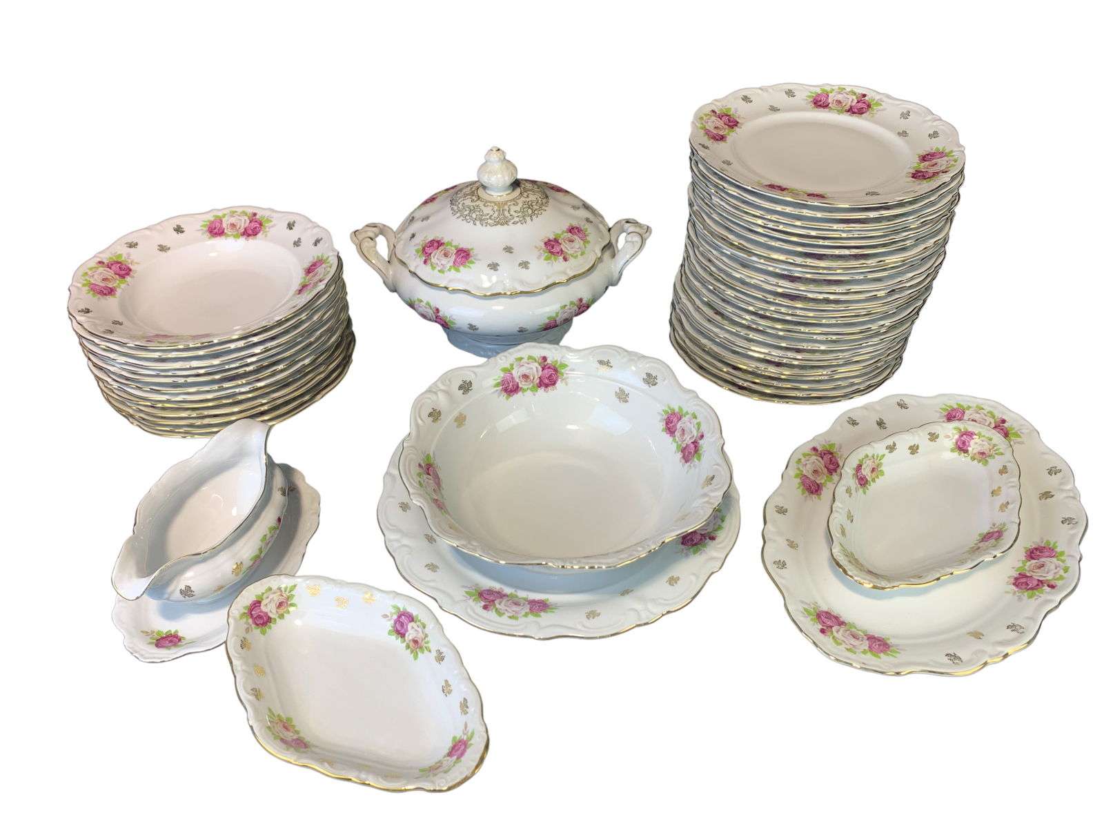 43 PC. BAVARIAN PORCELAIN DINNER SERVICE: 43 piece Bavarian porcelain dinner service having borders of intermittent sprays of roses and leaves including approx. 24 dinner plates, 6 other plates, 12 bowls, and a covered tureen