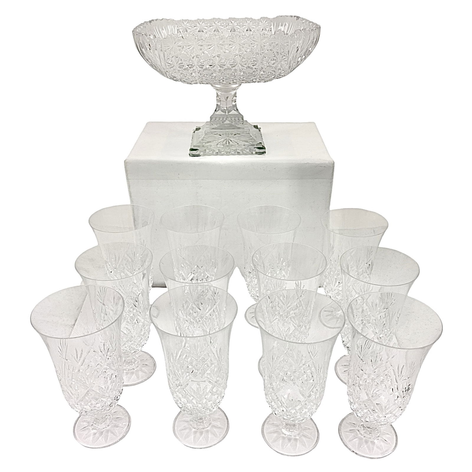 12 IRISH CRYSTAL GOBLETS AND CUT GLASS COMPOTE: 12 Galway Irish crystal goblets along with a cut glass compote. Goblets are 7" and compote is 7"h x 10"w