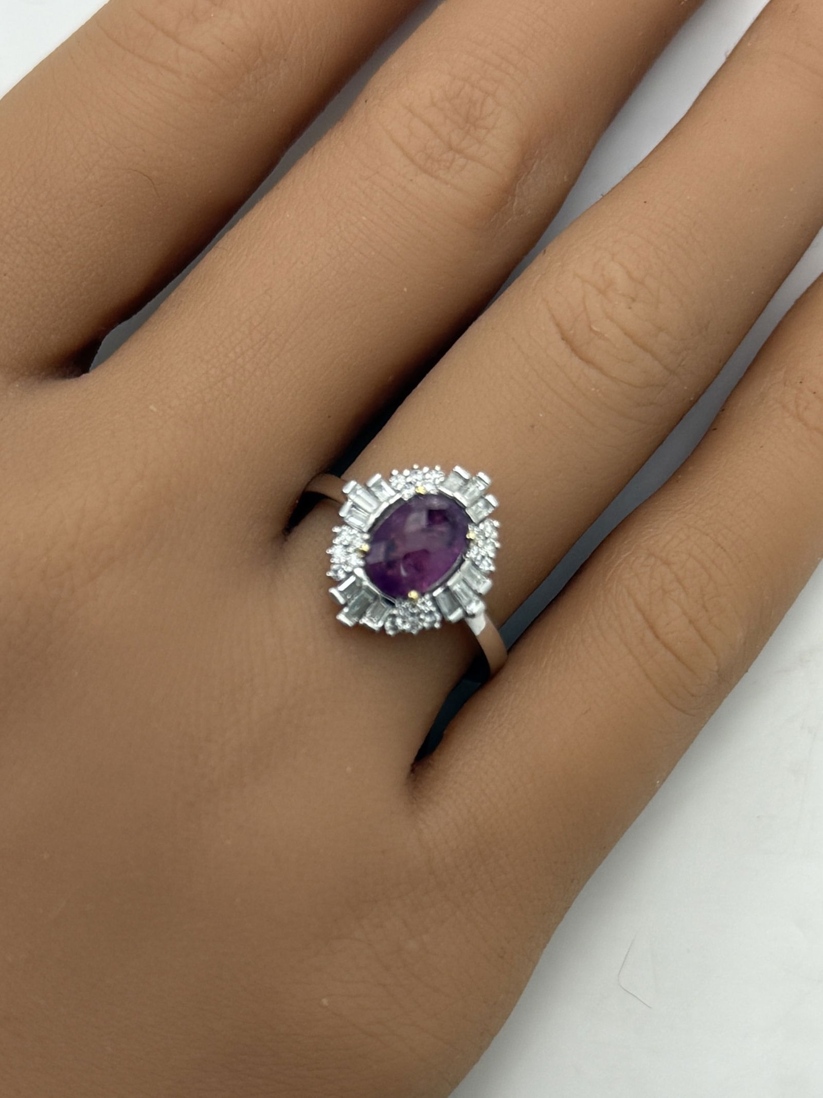 18K PINK SAPPHIRE AND DIAMOND RING, GIA: 18k two tone gold natural fancy purple-pink sapphire and diamond ring with 1.36ct center sapphire and .39cts of round diamonds. gross weight is 3.8 grams. size 6.75 . Please see all photos,