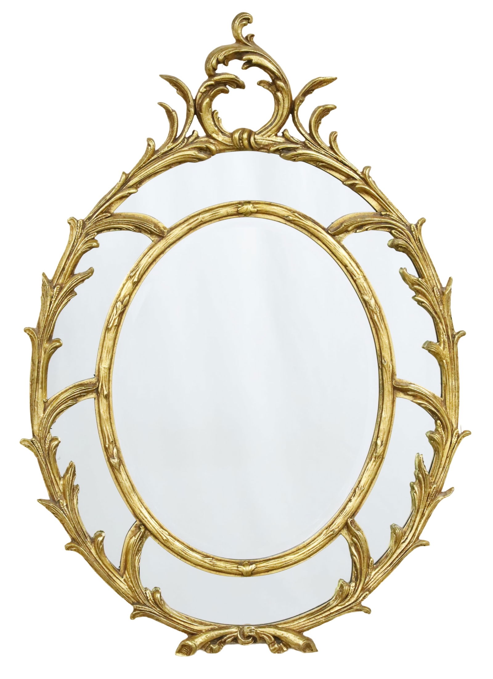 GEORGIAN STYLE GILTWOOD MIRROR: Georgian style giltwood mirror having scrolling acanthus crest rail and frame surrounding center oval foliated moulding, Friedman Brothers, 20th century; 52"H 35"W