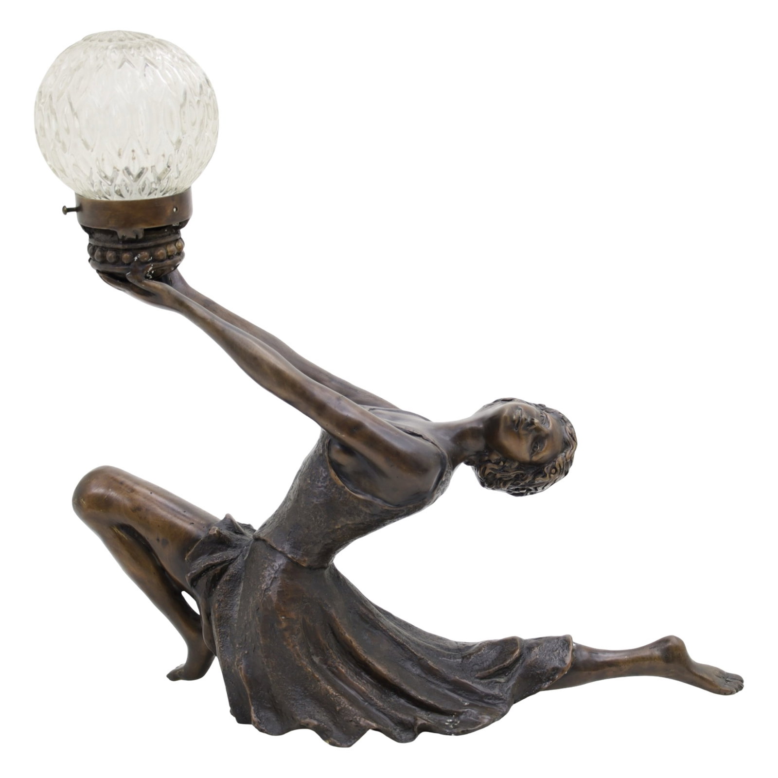 ART DECO STYLE BRONZE FIGURAL LAMP: Art Deco style bronze figural lamp of a lunging dancer holding an illuminating glass globe, mid 20th century; 22"H 23"W 8"D