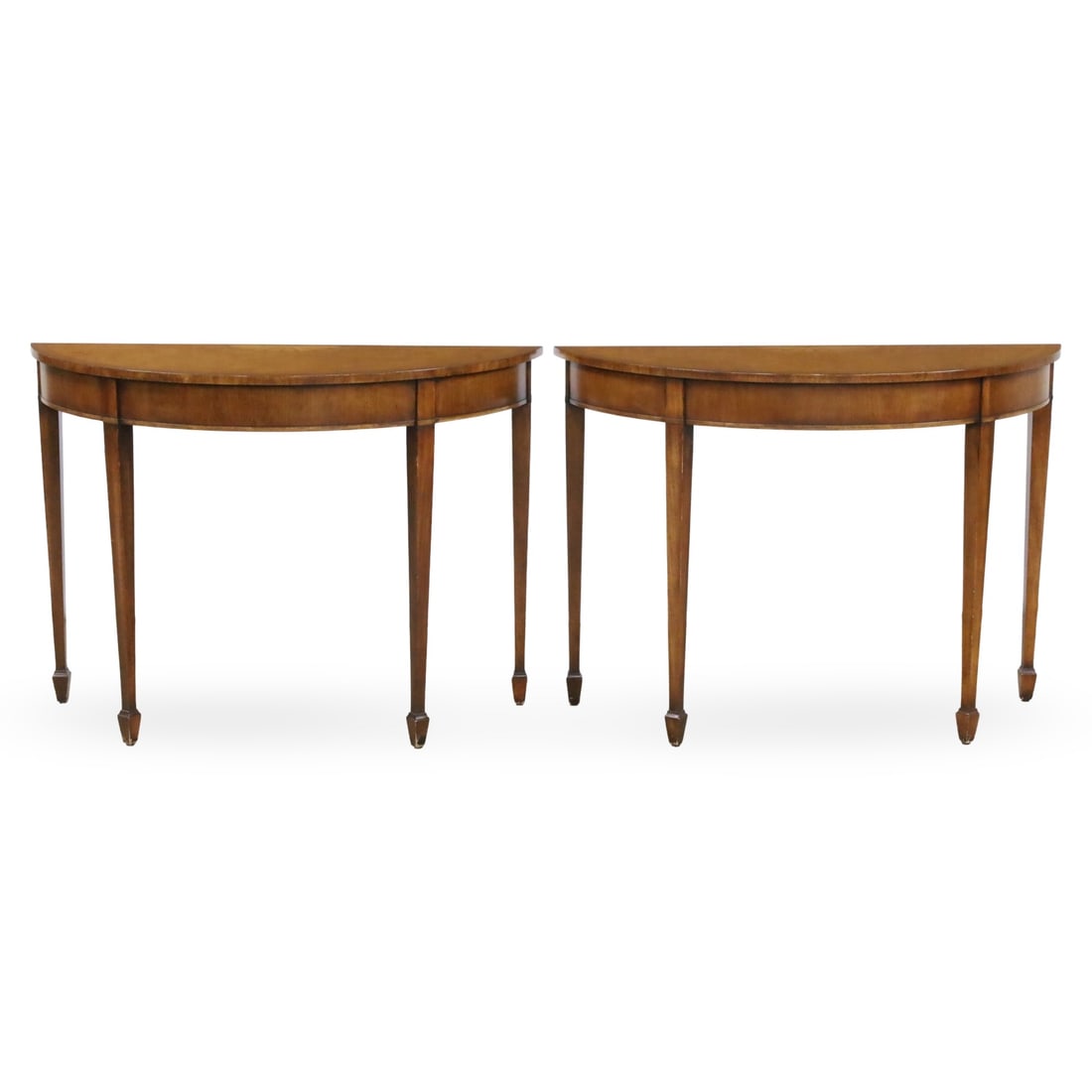 PR GEORGE III STYLE INLAID SATINWOOD CONSOLES: Pair of George III style satinwood demilune console tables, the top crossbanded with string and fan inlay, raised on tapered legs with spade feet, early to mid 20th century; each 33"H 45"W 19"D