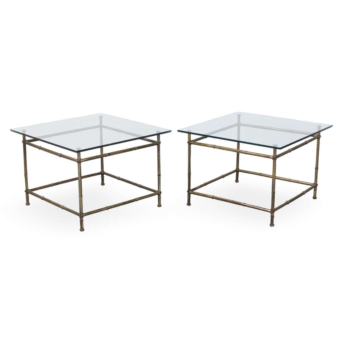 PR GLASS AND BRASS BAMBOO TABLES, STYLE OF ADNET: Pair of bamboo form brass tables with squre glass tops, in the style of Jacques Adnet, 20th century; 21"H 30"W 30"D