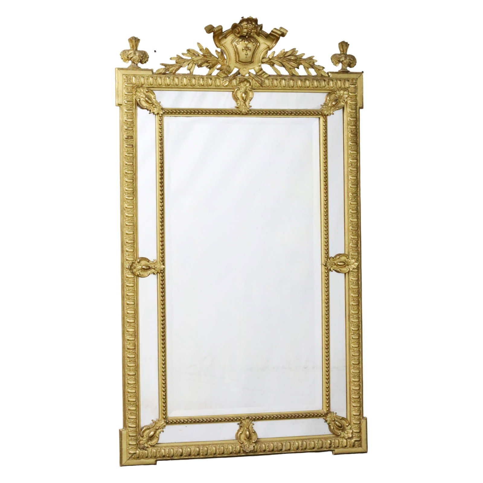FRENCH GILTWOOD MIRROR, 19TH C.: Stunningly carved French giltwood mirror having cartouche crest rail with acanthus flowing to fleur-de-lis surmounts, the frame decorated with egg and dart molding, marginal side plates mirrors framed