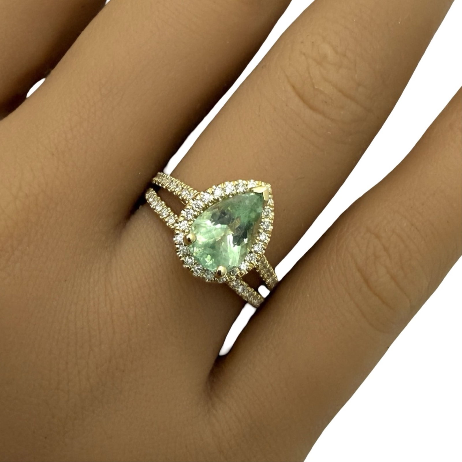 PARAIBA TOURMALINE AND DIAMOND SET: 14k two ring set with 1 GIA certified tourmaline center stone weighing 1.36ct and 75 genuine round diamonds weighing .64cts. total set gross weight is 4grams. size 5.75. Please see all photos,